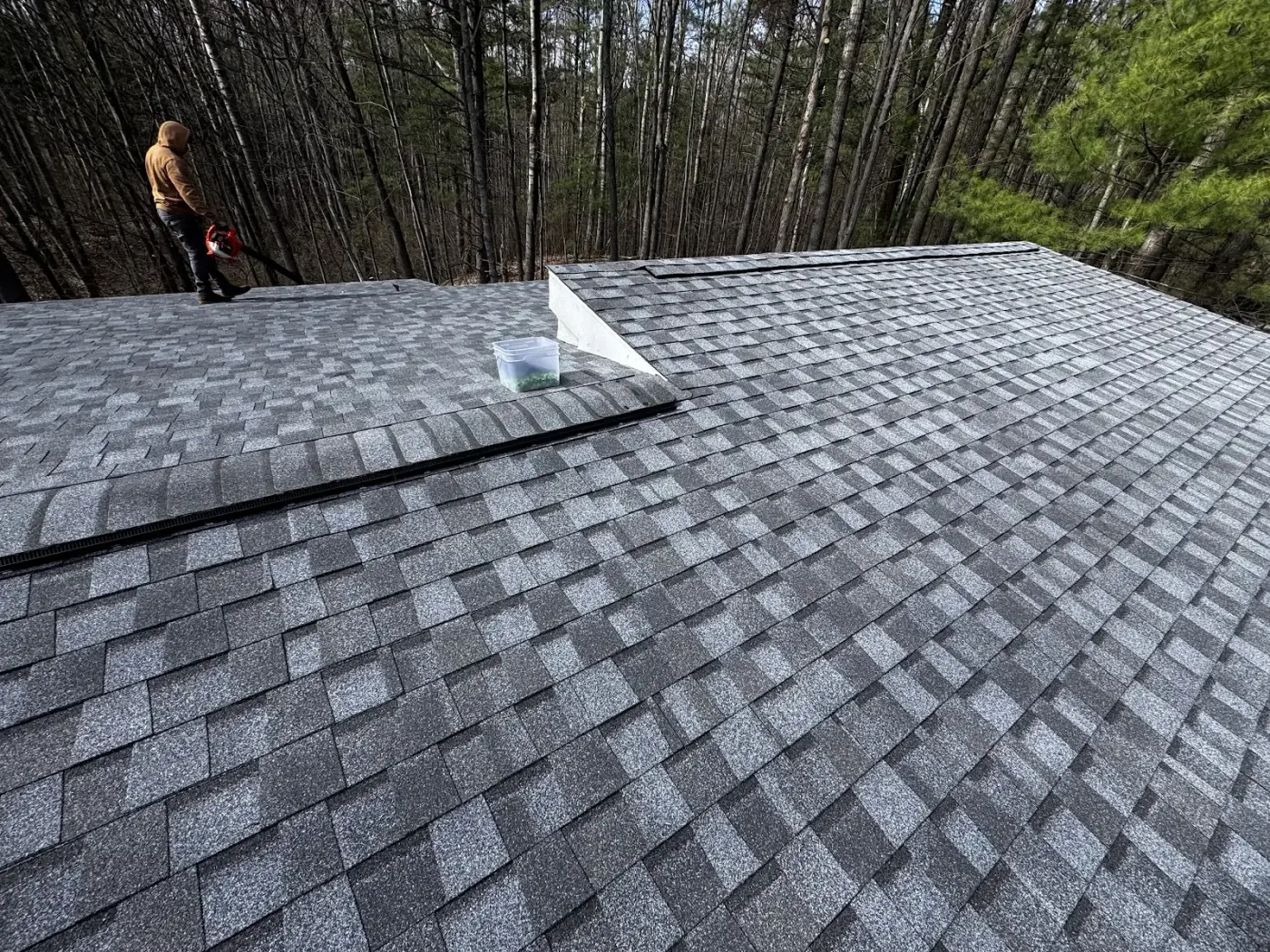 Blowing down a finished roof, the kind of detail a quality installation includes.