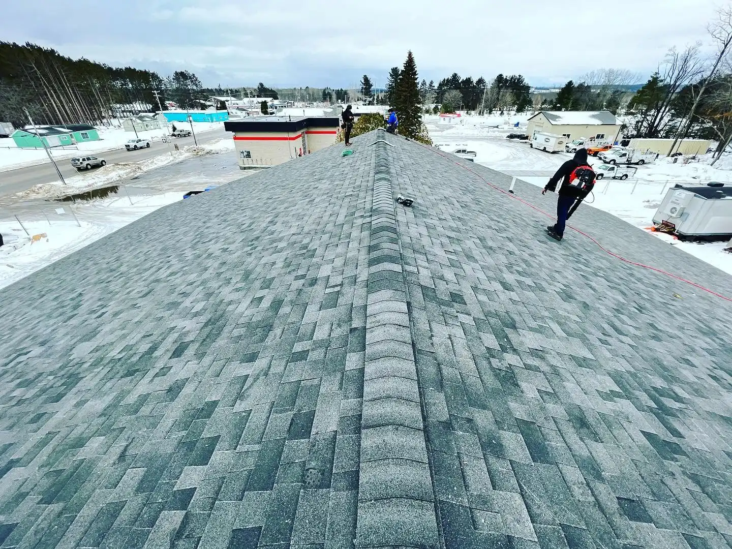 The Falcon Roofing team on a residential roofing project in the Benzonia area of Benzie County, Michigan