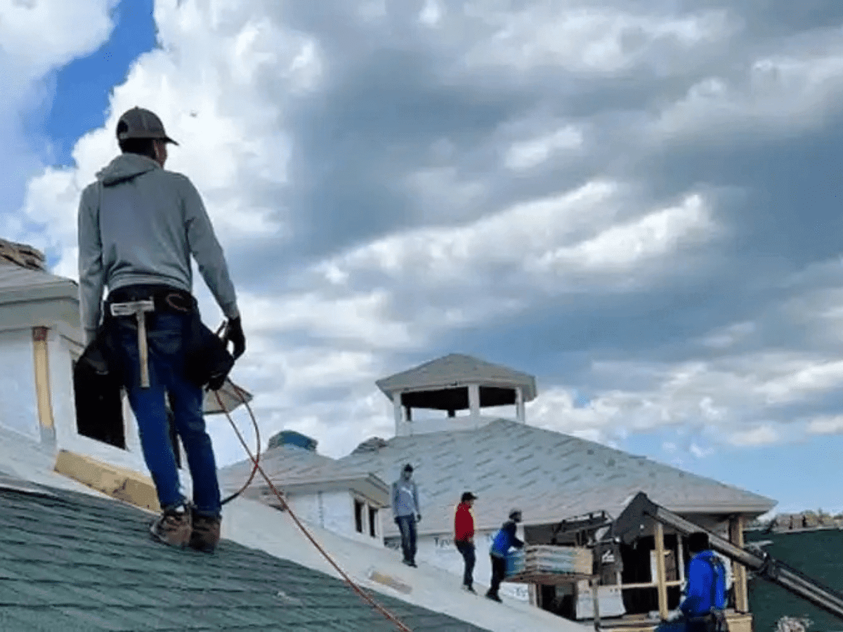 Falcon Roofing crew working on a roof in Northern Michigan