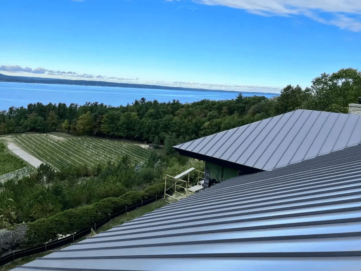 Commercial metal roof installation on a Northern Michigan building