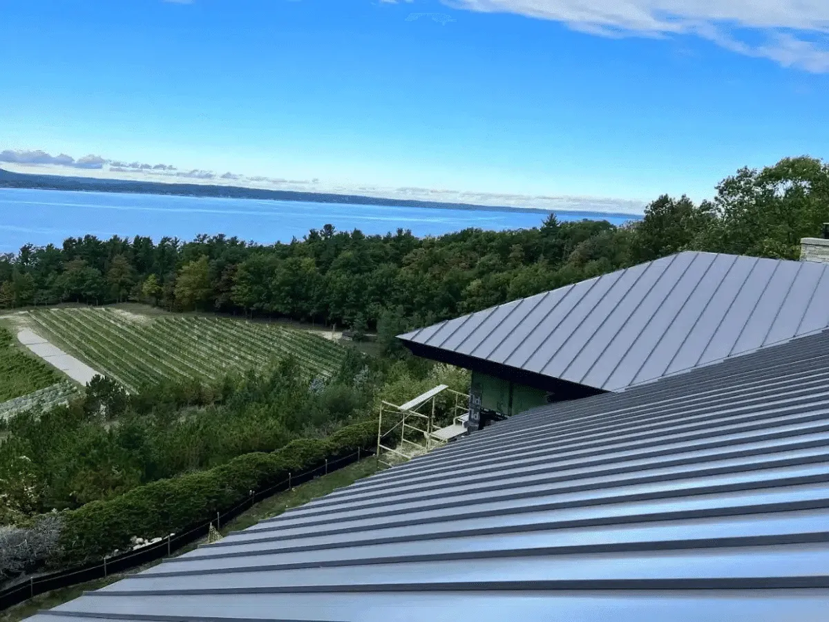 Commercial metal roof installation on a Northern Michigan building